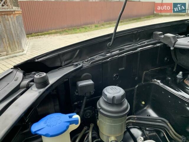 Черный Хендай Туксон, объемом двигателя 2 л и пробегом 114 тыс. км за 8850 $, фото 66 на Automoto.ua