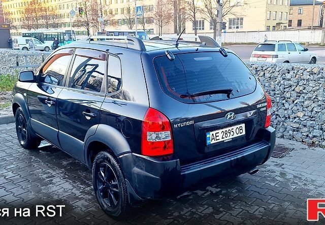 Черный Хендай Туксон, объемом двигателя 2 л и пробегом 240 тыс. км за 8700 $, фото 5 на Automoto.ua