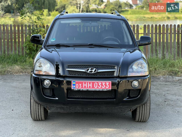 Черный Хендай Туксон, объемом двигателя 2 л и пробегом 243 тыс. км за 8000 $, фото 10 на Automoto.ua