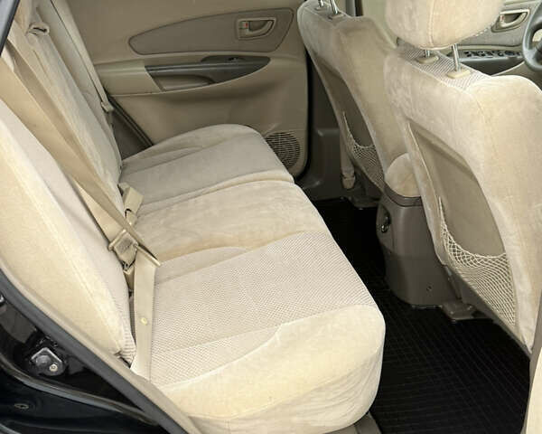 Черный Хендай Туксон, объемом двигателя 2 л и пробегом 191 тыс. км за 8500 $, фото 41 на Automoto.ua