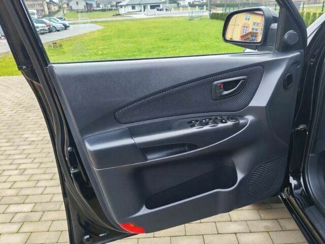 Чорний Хендай Туксон, об'ємом двигуна 1.98 л та пробігом 148 тис. км за 6199 $, фото 8 на Automoto.ua