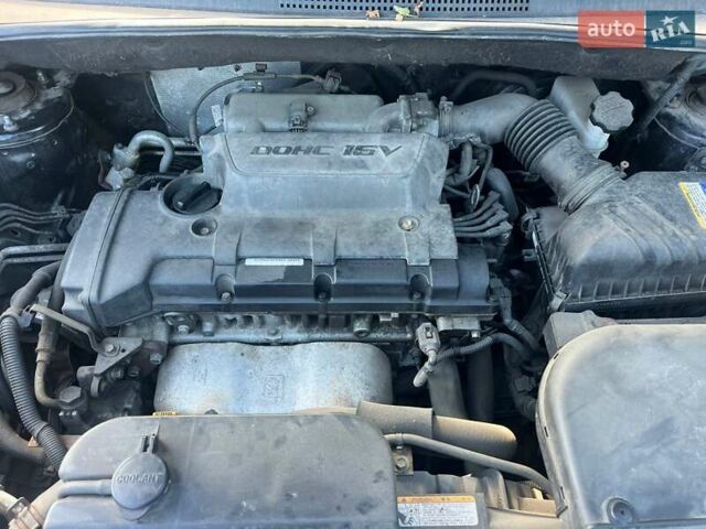 Чорний Хендай Туксон, об'ємом двигуна 2 л та пробігом 187 тис. км за 7900 $, фото 12 на Automoto.ua