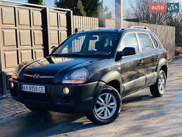 Черный Хендай Туксон, объемом двигателя 1.99 л и пробегом 95 тыс. км за 8500 $, фото 31 на Automoto.ua