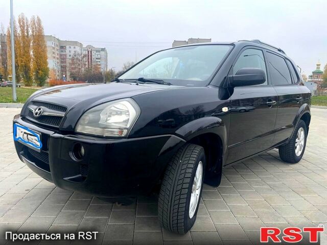 Черный Хендай Туксон, объемом двигателя 2 л и пробегом 168 тыс. км за 7700 $, фото 2 на Automoto.ua