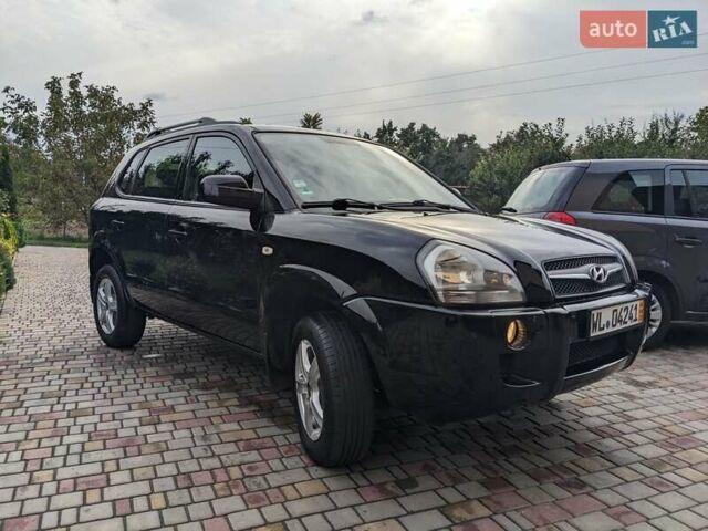 Чорний Хендай Туксон, об'ємом двигуна 2 л та пробігом 217 тис. км за 7700 $, фото 4 на Automoto.ua