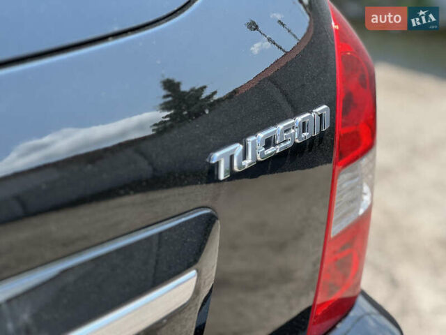Чорний Хендай Туксон, об'ємом двигуна 2 л та пробігом 163 тис. км за 9199 $, фото 11 на Automoto.ua
