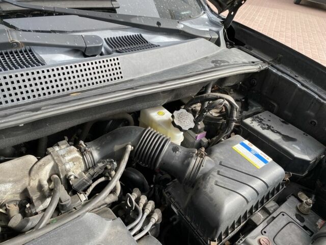 Черный Хендай Туксон, объемом двигателя 2 л и пробегом 200 тыс. км за 8999 $, фото 14 на Automoto.ua