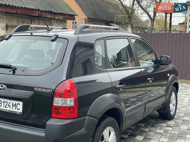 Чорний Хендай Туксон, об'ємом двигуна 2 л та пробігом 200 тис. км за 8450 $, фото 7 на Automoto.ua
