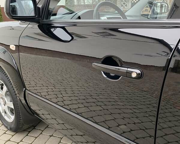 Черный Хендай Туксон, объемом двигателя 2 л и пробегом 114 тыс. км за 8850 $, фото 24 на Automoto.ua