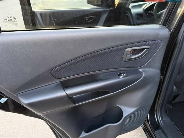 Черный Хендай Туксон, объемом двигателя 2 л и пробегом 148 тыс. км за 8700 $, фото 14 на Automoto.ua