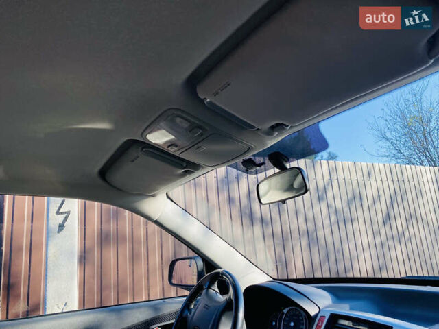 Черный Хендай Туксон, объемом двигателя 1.99 л и пробегом 95 тыс. км за 8700 $, фото 22 на Automoto.ua