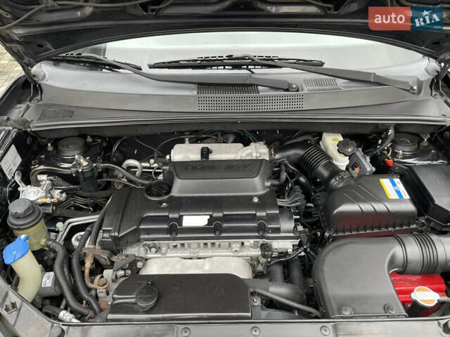 Чорний Хендай Туксон, об'ємом двигуна 2 л та пробігом 200 тис. км за 8450 $, фото 39 на Automoto.ua