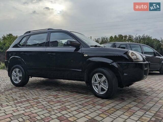 Чорний Хендай Туксон, об'ємом двигуна 2 л та пробігом 217 тис. км за 7700 $, фото 7 на Automoto.ua