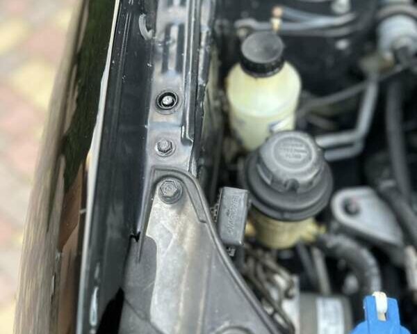 Черный Хендай Туксон, объемом двигателя 1.98 л и пробегом 198 тыс. км за 8250 $, фото 19 на Automoto.ua