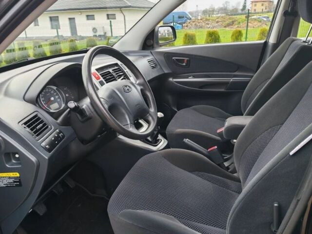 Чорний Хендай Туксон, об'ємом двигуна 1.98 л та пробігом 148 тис. км за 6199 $, фото 9 на Automoto.ua