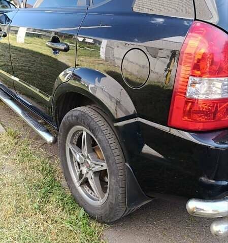 Черный Хендай Туксон, объемом двигателя 2 л и пробегом 226 тыс. км за 8700 $, фото 12 на Automoto.ua