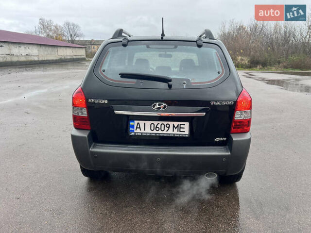 Хендай Туксон 2009 в Шостке на Automoto.ua Черный Хендай Туксон, объемом двигателя 1.98 л и пробегом 204 тыс. км за 9299 $, фото 10 на Automoto.ua