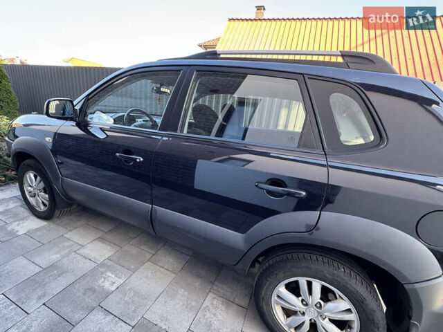 Чорний Хендай Туксон, об'ємом двигуна 1.98 л та пробігом 200 тис. км за 8200 $, фото 2 на Automoto.ua