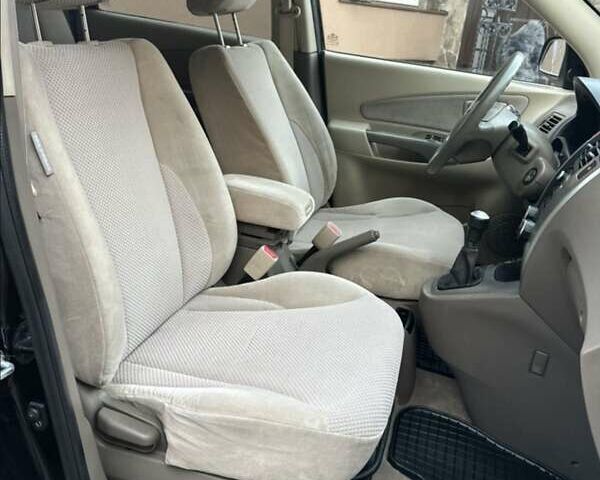 Черный Хендай Туксон, объемом двигателя 1.98 л и пробегом 198 тыс. км за 8250 $, фото 25 на Automoto.ua