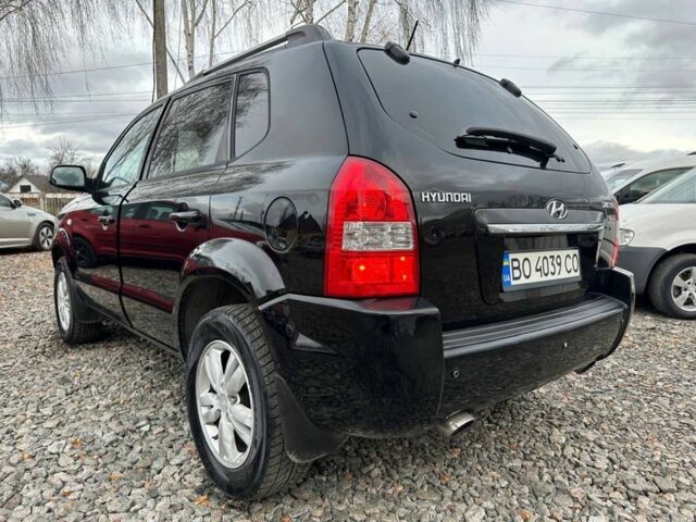 Черный Хендай Туксон, объемом двигателя 2 л и пробегом 166 тыс. км за 7500 $, фото 3 на Automoto.ua