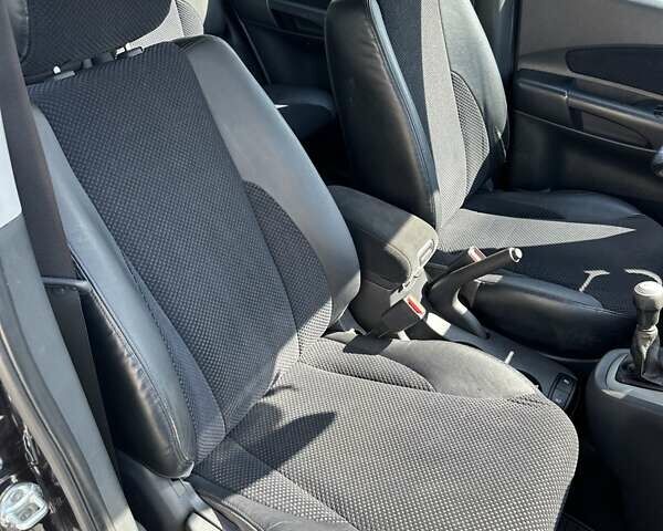 Хендай Туксон 2009 в Харькове на Automoto.ua Черный Хендай Туксон, объемом двигателя 1.99 л и пробегом 92 тыс. км за 9500 $, фото 15 на Automoto.ua