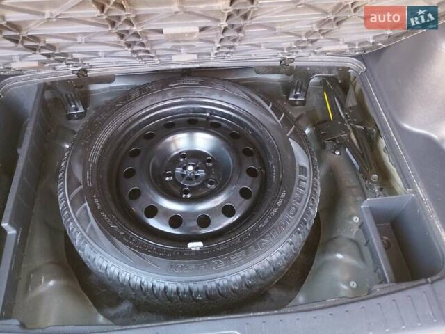 Черный Хендай Туксон, объемом двигателя 1.99 л и пробегом 159 тыс. км за 9700 $, фото 4 на Automoto.ua