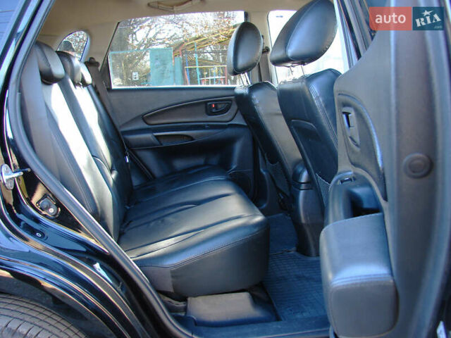 Черный Хендай Туксон, объемом двигателя 2 л и пробегом 162 тыс. км за 8200 $, фото 22 на Automoto.ua