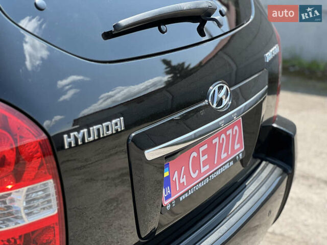 Чорний Хендай Туксон, об'ємом двигуна 2 л та пробігом 163 тис. км за 9199 $, фото 10 на Automoto.ua