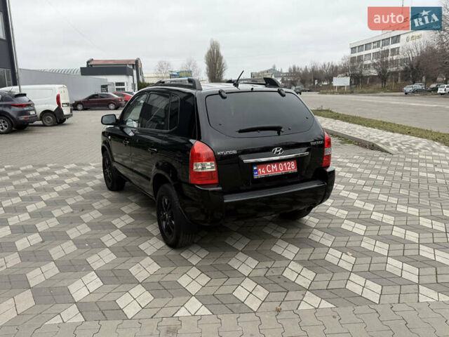 Черный Хендай Туксон, объемом двигателя 2 л и пробегом 191 тыс. км за 8500 $, фото 22 на Automoto.ua