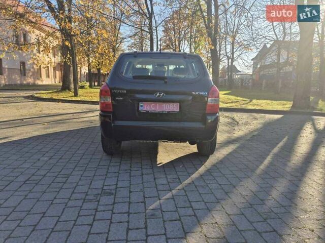 Чорний Хендай Туксон, об'ємом двигуна 2 л та пробігом 187 тис. км за 7900 $, фото 3 на Automoto.ua