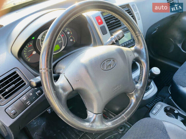 Черный Хендай Туксон, объемом двигателя 1.99 л и пробегом 95 тыс. км за 8500 $, фото 38 на Automoto.ua