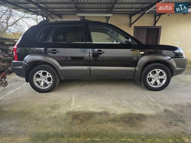 Хендай Туксон 2009 в Гусятине на Automoto.ua Черный Хендай Туксон, объемом двигателя 2 л и пробегом 143 тыс. км за 9700 $, фото 3 на Automoto.ua