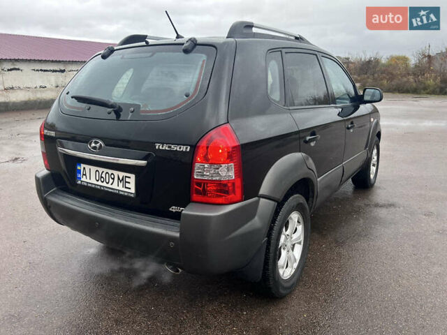 Хендай Туксон 2009 в Шостке на Automoto.ua Черный Хендай Туксон, объемом двигателя 1.98 л и пробегом 204 тыс. км за 9299 $, фото 9 на Automoto.ua