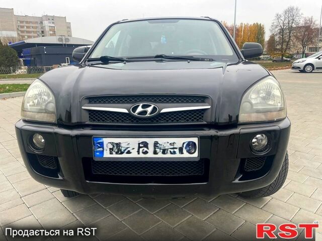 Черный Хендай Туксон, объемом двигателя 2 л и пробегом 168 тыс. км за 7700 $, фото 1 на Automoto.ua