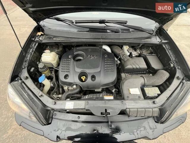 Черный Хендай Туксон, объемом двигателя 2 л и пробегом 128 тыс. км за 9200 $, фото 16 на Automoto.ua
