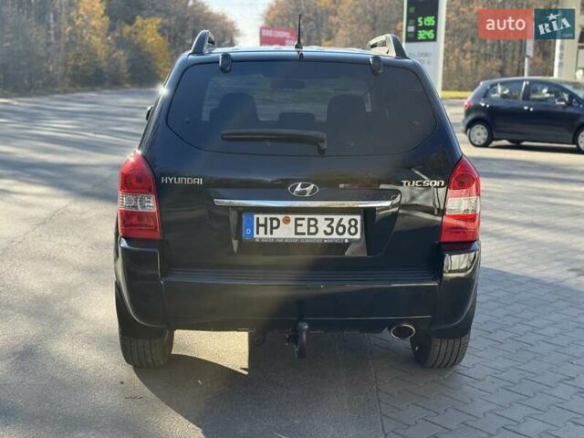 Черный Хендай Туксон, объемом двигателя 2 л и пробегом 148 тыс. км за 8700 $, фото 42 на Automoto.ua