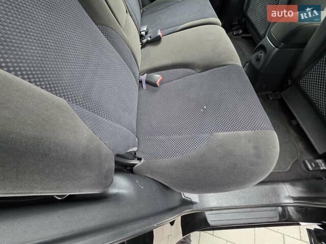 Чорний Хендай Туксон, об'ємом двигуна 2 л та пробігом 93 тис. км за 9750 $, фото 88 на Automoto.ua