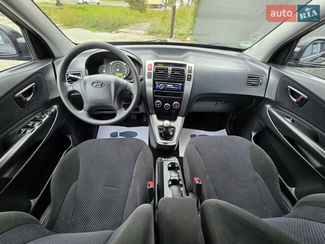 Чорний Хендай Туксон, об'ємом двигуна 2 л та пробігом 93 тис. км за 9750 $, фото 71 на Automoto.ua