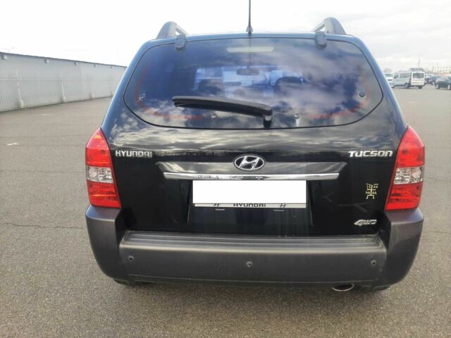 Чорний Хендай Туксон, об'ємом двигуна 2 л та пробігом 130 тис. км за 9200 $, фото 4 на Automoto.ua