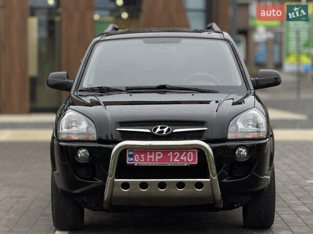 Черный Хендай Туксон, объемом двигателя 1.98 л и пробегом 202 тыс. км за 7650 $, фото 3 на Automoto.ua
