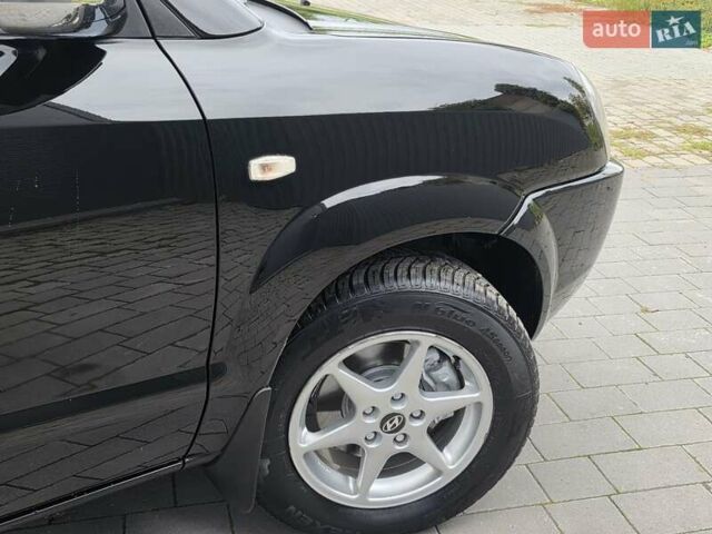 Чорний Хендай Туксон, об'ємом двигуна 2 л та пробігом 93 тис. км за 9750 $, фото 25 на Automoto.ua