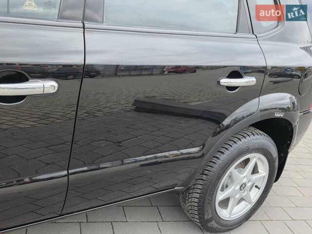 Чорний Хендай Туксон, об'ємом двигуна 2 л та пробігом 93 тис. км за 9750 $, фото 20 на Automoto.ua