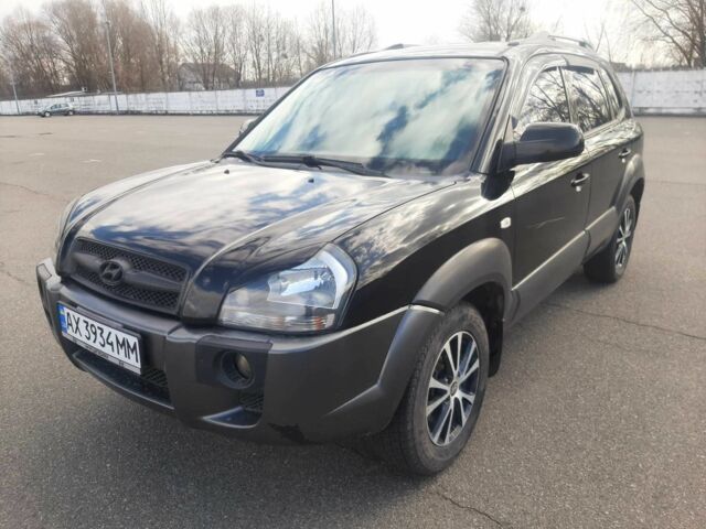 Чорний Хендай Туксон, об'ємом двигуна 2 л та пробігом 130 тис. км за 9200 $, фото 7 на Automoto.ua