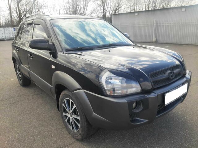 Чорний Хендай Туксон, об'ємом двигуна 2 л та пробігом 130 тис. км за 9200 $, фото 1 на Automoto.ua