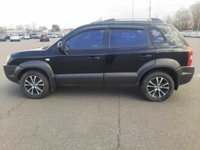 Чорний Хендай Туксон, об'ємом двигуна 2 л та пробігом 130 тис. км за 9200 $, фото 6 на Automoto.ua