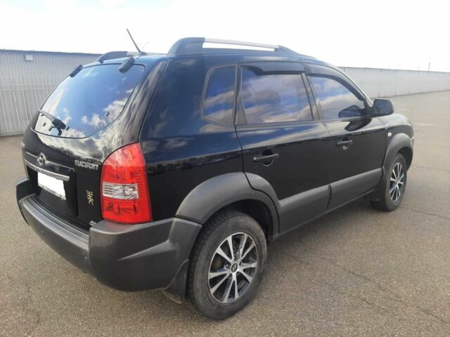 Чорний Хендай Туксон, об'ємом двигуна 2 л та пробігом 130 тис. км за 9200 $, фото 3 на Automoto.ua