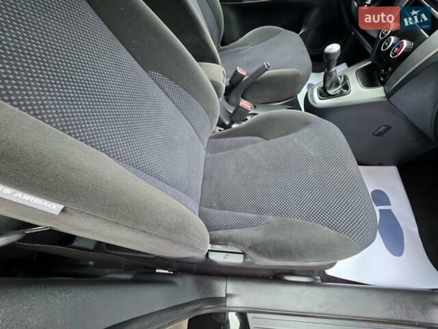 Чорний Хендай Туксон, об'ємом двигуна 2 л та пробігом 93 тис. км за 9750 $, фото 95 на Automoto.ua
