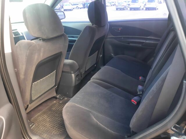 Чорний Хендай Туксон, об'ємом двигуна 2 л та пробігом 130 тис. км за 9200 $, фото 9 на Automoto.ua