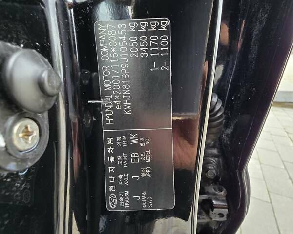 Чорний Хендай Туксон, об'ємом двигуна 2 л та пробігом 93 тис. км за 9750 $, фото 104 на Automoto.ua