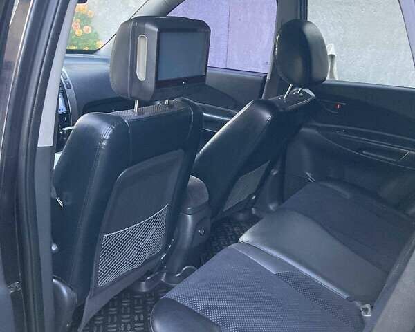 Чорний Хендай Туксон, об'ємом двигуна 2.66 л та пробігом 120 тис. км за 8500 $, фото 12 на Automoto.ua
